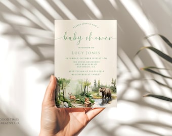 May include: A baby shower invitation with a woodland theme. The invitation features a watercolor illustration of a forest with a bear, deer, and squirrel. The text on the invitation reads "Please join us for a baby shower in honor of Lucy Jones. Saturday, October 15th at 3pm. The Jones Residence, 11223 Beach Blvd, San Diego, CA. RSVP to Sam at 555-555-1234. Registered at Target."