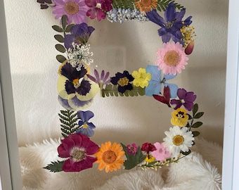 Handmade pressed flower initial art, custom created just for you. Each letter is carefully designed using real pressed flowers and framed.