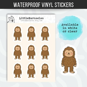 May include: Waterproof vinyl stickers featuring a cartoon Bigfoot character in brown. The stickers are available in white or clear. The text "WATERPROOF VINYL STICKERS" is at the top of the image. The Etsy shop name "LittleBarnacles" is also visible.