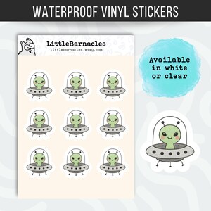 May include: A sheet of nine waterproof vinyl stickers featuring a green alien inside a grey flying saucer, with the text LittleBarnacles and littlebarnacles.etsy.com at the top. A separate sticker is shown next to the sheet with the text Available in white or clear.