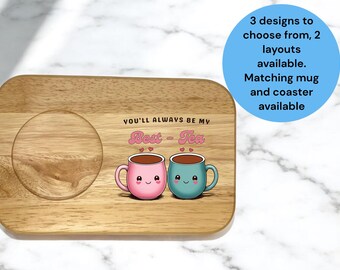 May include: Wooden serving tray with a cutout for a mug. The tray has a pink and blue mug design with the text "You'll always be my Best - Tea".