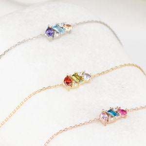 Pulsera con piedra natal talla marquesa baguette, plata de ley, joyería familiar personalizada.