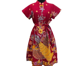 Red cheongsam batik dresses on bird pattern