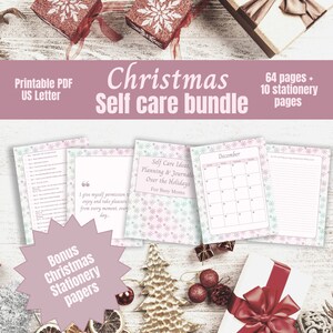 May include: A printable Christmas self-care bundle for busy moms. The bundle includes 64 pages of self-care ideas, planning, and journaling, as well as 10 pages of stationery. The cover features a pink and white snowflake design.