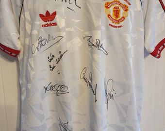 Manchester united multiple signed 91 cup winners shirt.