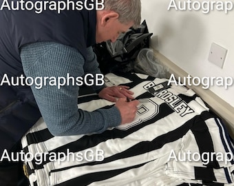 Peter Beardsley signed Newcastle United shirts