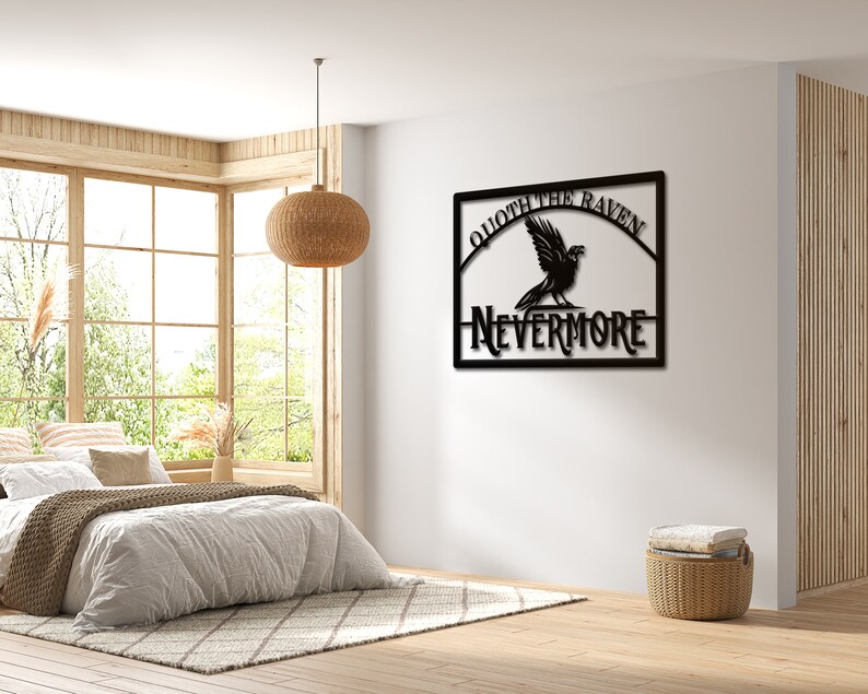May include: Black metal wall art featuring a raven with the text "Quote the Raven Nevermore".