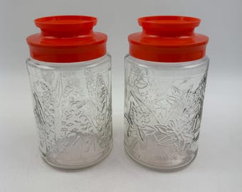 Juego de 2 tarros de cristal vintage Anchor Hocking con diseño floral y tapa naranja, para cocina, EE. UU., década de 1980