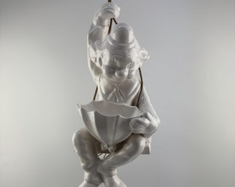 Porcelain Flowerpot Clown on Swing - 1970s