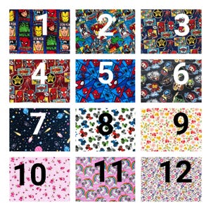 May include: A grid of twelve fabric swatches featuring various patterns including Marvel comic book characters, outer space motifs with planets and stars, green tractors, colorful floral prints, and unicorns with rainbows on pink backgrounds.