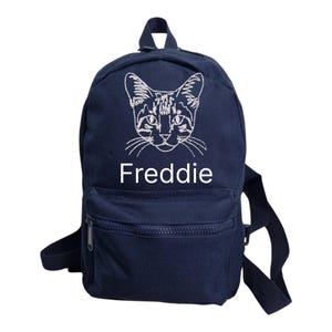 Sac à dos personnalisé brodé • Mini cartable pour la maternelle • Sac à dos personnalisé avec tête de chat. Livraison rapide.