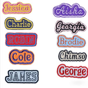 May include: Ten colourful embroidered iron-on name patches with various names including Jessica, Aisha, Charlie, Georgia, Robin, Brodie, Cole, Chimso, James, and George.