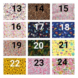 May include: A grid of twelve fabric swatches labeled 13 through 24, featuring various patterns including floral prints, leopard spots, space themes with rockets and astronauts, dinosaur illustrations, jungle scenes with leopards, and yellow summer motifs.