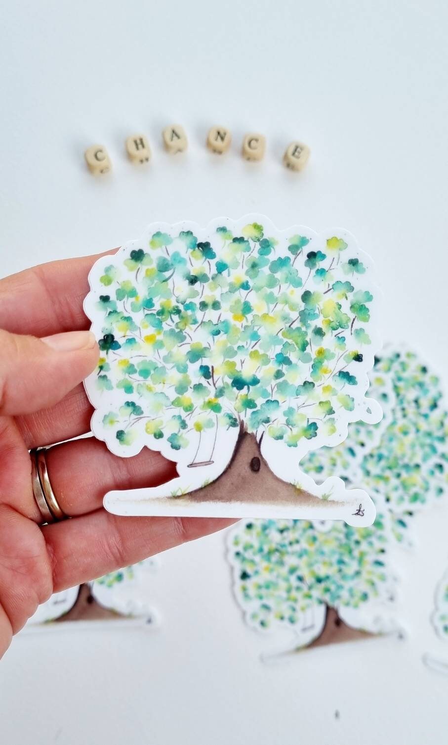Sticker illustration aquarelle arbre vert balançoire poétique