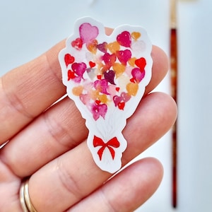 Sticker bouquet de coeurs ballons, rouge orange nœud rouge