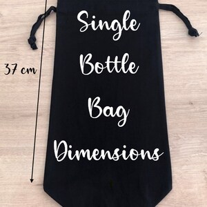 May include: Black drawstring bag with white text that reads "Single Bottle Bag Dimensions". The bag is 17 inches wide and 37 inches tall.