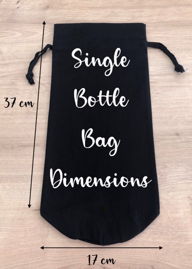 May include: Black drawstring bag with white text that reads "Single Bottle Bag Dimensions". The bag is 17 inches wide and 37 inches tall.