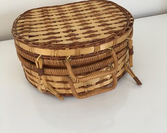 Cesta de mimbre vintage pequeña y redonda