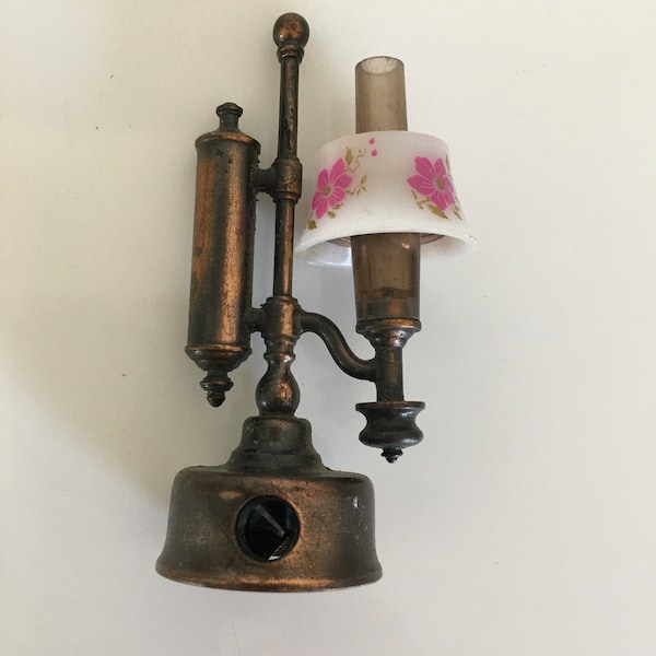 Old vintage pencil sharpener Old copper lamp