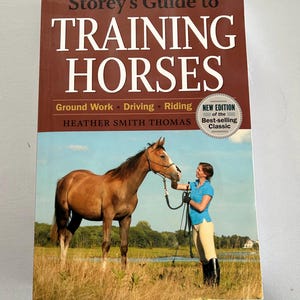 Storey&#39;s Guide to Training Horses: Ground Work, Driving and Riding by Heather Smith Thomas Paperback Guide Book (2010)