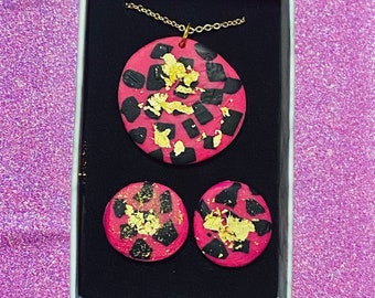 Pink, black, gold jewellery adornment