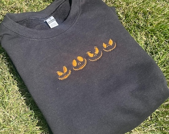Jack Skellington Faces Embroidered Halloween Crewneck