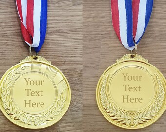 Personalised engraved Gold coloured metal medal with your own wording/message. Add text to the back of the medal. Comes with lanyard. Winner