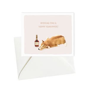 Carte d'anniversaire Corgi - Carte de voeux amusante avec bouteille Hennessy - Nous vous souhaitons une bonne gueule de bois - Cadeau parfait pour les amoureux des chiens