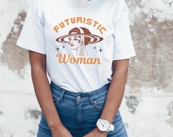 May include: White t-shirt with a retro-style illustration of a woman with a ring of planets around her head. The text "Futuristic Woman" is printed below the illustration.