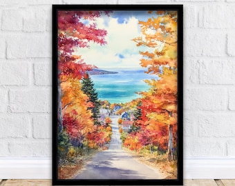 May include: A framed watercolor painting of a scenic road leading to a coastal town. The artwork features vibrant autumn foliage in shades of red, orange, and yellow framing the road. A body of turquoise water and blue sky are visible in the distance.
