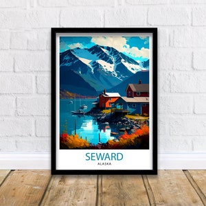 May include: A framed print of a colorful illustration of a mountain range with snow-capped peaks, a blue lake, and red houses on the shore. The text "SEWARD ALASKA" is at the bottom of the print.