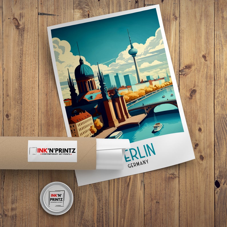 May include: A colorful illustration of the Berlin skyline featuring the Brandenburg Gate, the Reichstag building, and the Berlin TV Tower. The illustration is in a retro style with a blue sky and white clouds. The text "Berlin, Germany" is printed below the illustration.