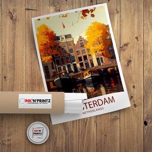 May include: A vintage travel poster featuring a colorful illustration of Amsterdam, Netherlands. The poster depicts a canal with boats and buildings along the water's edge. The text "Amsterdam, Netherlands" is printed at the bottom of the poster.