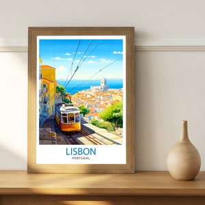 May include: A vintage travel poster featuring a yellow tram traveling up a hill in Lisbon, Portugal. The poster has a blue sky with white clouds and a view of the city and the Tagus River in the background. The text on the poster reads "LISBON, PORTUGAL".