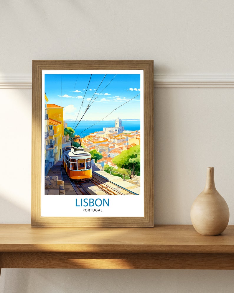 May include: A vintage travel poster featuring a yellow tram traveling up a hill in Lisbon, Portugal. The poster has a blue sky with white clouds and a view of the city and the Tagus River in the background. The text on the poster reads "LISBON, PORTUGAL".