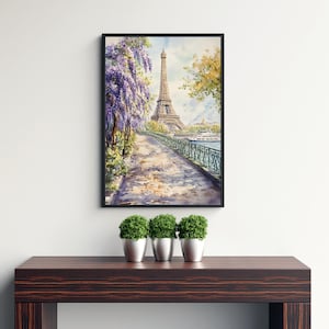 K&ouml;nnte beinhalten: Ein Aquarellbild des Eiffelturms in Paris, Frankreich. Der Turm ist in der Ferne dargestellt, mit einem Weg, der zu ihm f&uuml;hrt. Der Weg ist mit B&auml;umen und Blumen ges&auml;umt, und die Seine ist im Hintergrund zu sehen.