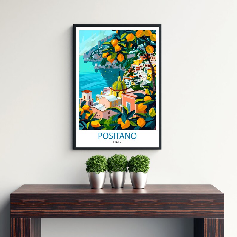 K&ouml;nnte beinhalten: Eine farbenfrohe Illustration von Positano, Italien, mit Blick auf die Stadt und das Mittelmeer. Das Bild zeigt einen Zitronenbaum im Vordergrund, mit der Stadt Positano im Hintergrund. Der Text "Positano, Italien" ist unter dem Bild gedruckt.