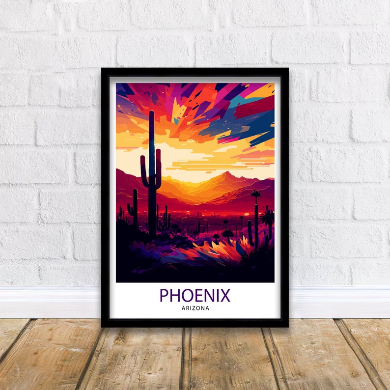 May include: A colourful abstract illustration of a desert landscape with a large saguaro cactus in the foreground. The sky is a vibrant orange and pink, with a mountain range in the distance. The text "PHOENIX ARIZONA" is at the bottom of the image.