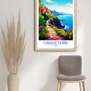 May include: A colorful illustration of a coastal town in Cinque Terre, Italy. The image features a winding stone path leading up a hillside with colorful buildings and lush greenery. The path overlooks a blue ocean with white waves crashing on the shore.