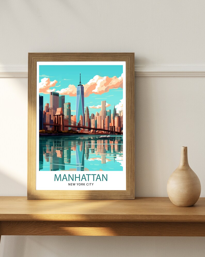 May include: A framed print of a colorful illustration of the Manhattan skyline with the Brooklyn Bridge and the Freedom Tower. The text "MANHATTAN NEW YORK CITY" is at the bottom of the print.