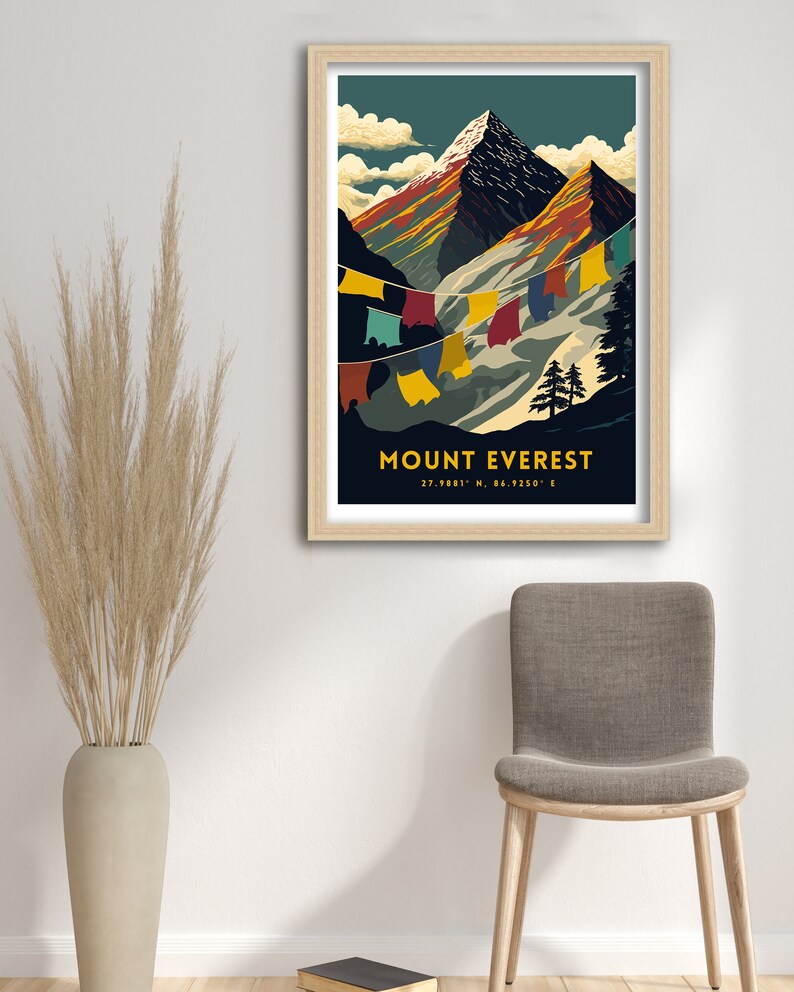 May include: A vintage travel poster design featuring a colorful illustration of Mount Everest with prayer flags hanging in the wind. The poster has a dark blue background with the text "MOUNT EVEREST 27.9881&deg; N, 86.9250&deg; E" in yellow.