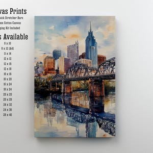 May include: A watercolor painting of a cityscape with a bridge over a river. The city skyline is reflected in the water. The painting is on a canvas with 2cm thick stretcher bars and a hanging kit included. Sizes available: 8x10, 8x12 (A4), 11x14, 12x12, 12x16, 12x18, 16x16, 16x20, 16x24, 18x24, 20x20, 20x28, 24x32, 24x36, 28x40.