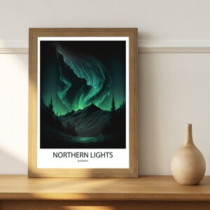 May include: A framed poster with a dark green background featuring a vibrant green aurora borealis over a mountain range and a lake. The text "NORTHERN LIGHTS" and "NORWAY" is printed below the image.