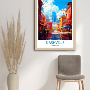 May include: A colorful illustration of a street scene in Nashville, Tennessee. The illustration features a tall building with a pointed roof, a street lined with shops and buildings, and a blue sky with white clouds. The text "NASHVILLE" and "TENNESSEE" is printed at the bottom of the illustration.