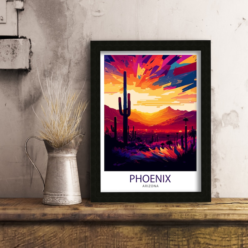 May include: A framed print of a colourful, abstract landscape with a desert sunset and cacti. The text "PHOENIX ARIZONA" is at the bottom of the print.