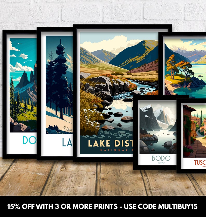 May include: Set of five illustrated travel posters featuring scenic landscapes. The posters are framed in black and have white text. The posters feature locations such as Lake District National Park, Bodo, Norway, Tuscany, Italy, and more.