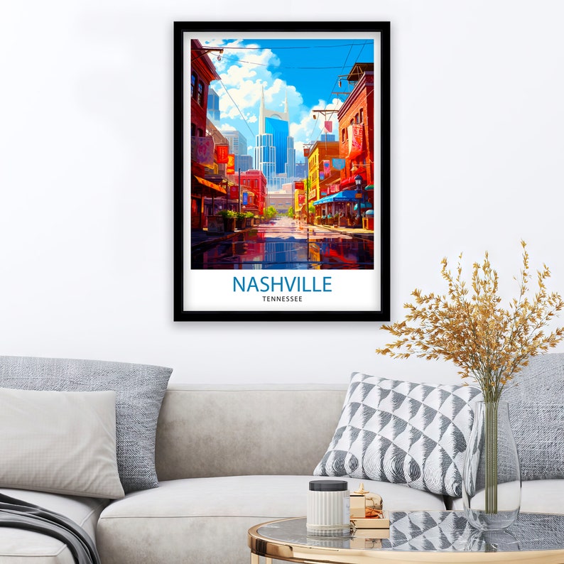 May include: A colorful illustration of a street scene in Nashville, Tennessee. The image features a cityscape with tall buildings, including the iconic Ryman Auditorium, and a street lined with shops and restaurants. The sky is blue with white clouds, and the street is wet from rain.