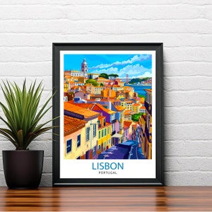 May include: A colorful illustration of Lisbon, Portugal, with a view of the city's rooftops and the Tagus River. The illustration features a bright blue sky, white clouds, and a red bridge in the distance. The text "LISBON" and "PORTUGAL" is printed below the image.