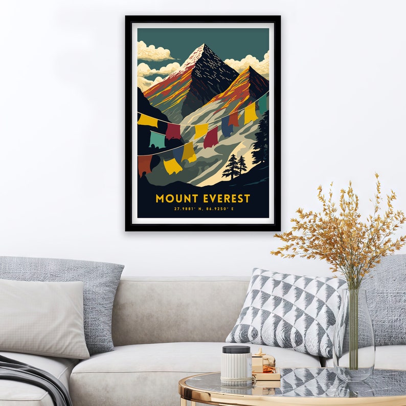 May include: A vintage travel poster design featuring a colorful illustration of Mount Everest with prayer flags hanging in the foreground. The text "MOUNT EVEREST 27.9881&deg; N, 86.9250&deg; E" is printed below the mountain.