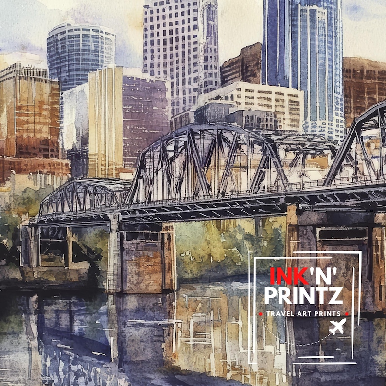 May include: Watercolor painting of a bridge over a river with buildings in the background. The bridge is made of metal and has a dark gray color. The buildings are tall and have a variety of colors, including gray, brown, and white. The river is blue and reflects the buildings and bridge. The painting is signed "Ink'n' Printz Travel Art Prints" in the lower right corner.